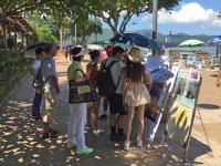 Signing up for boat trips, Sai Kung waterfront