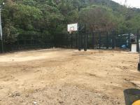 Sok Kwu Wan basketball court covered in sand from typhoon